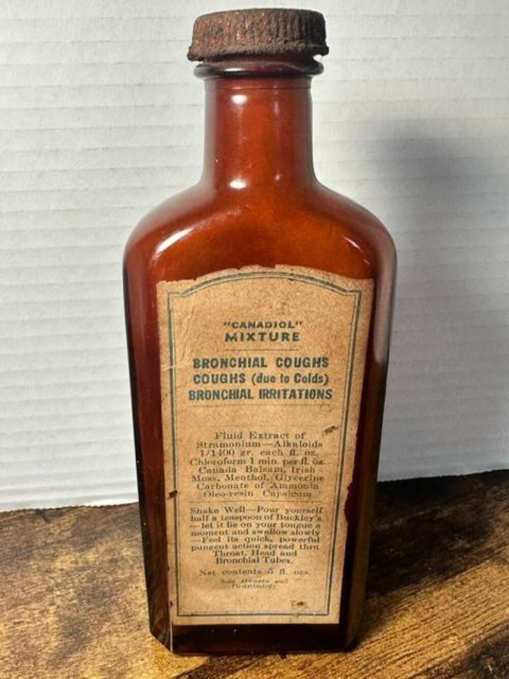 * Antique Buckley's Canadiol Mixture Medicine Bottle Amber Medicine Bottle